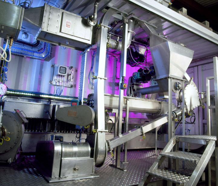 Stainless steel process plant with screw conveyor, hopper and access steps