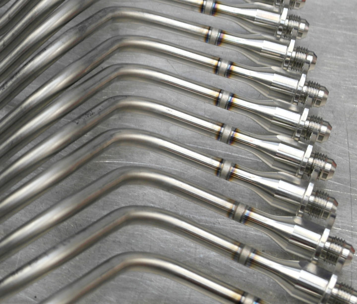 Orbital-welded stainless steel tube assemblies with fittings